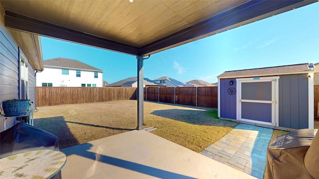 view of patio / terrace featuring a storage unit