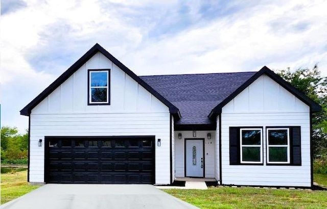 modern farmhouse with a garage