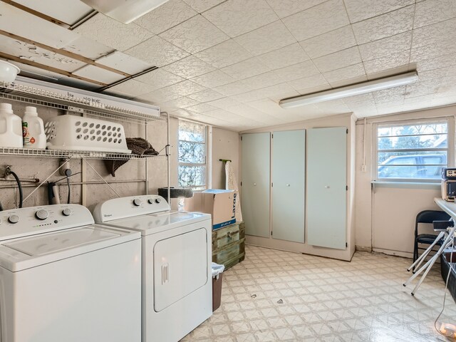 washroom with washing machine and dryer