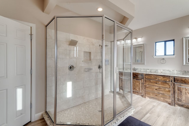 bathroom featuring vanity and walk in shower