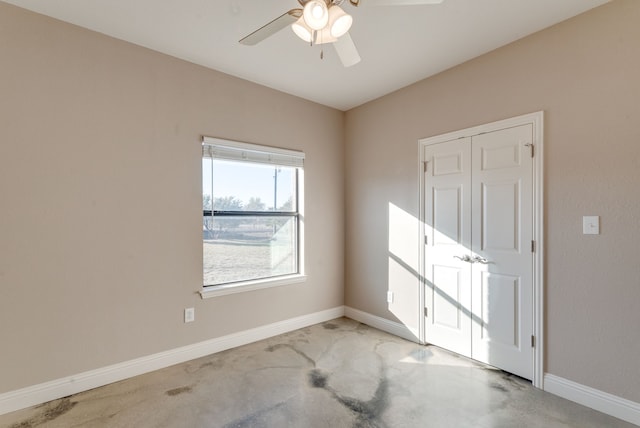 unfurnished room with ceiling fan and light colored carpet