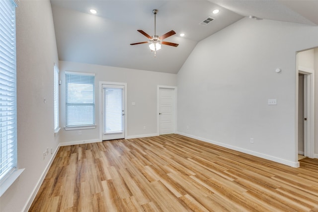 unfurnished living room featuring light hardwood / wood-style floors, vaulted ceiling, and ceiling fan