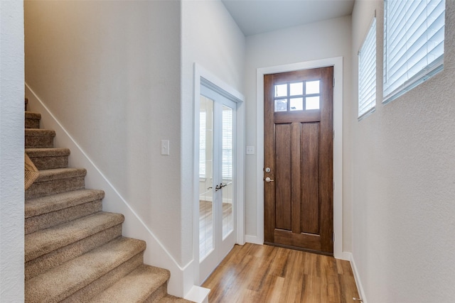 entrance foyer with light hardwood / wood-style floors