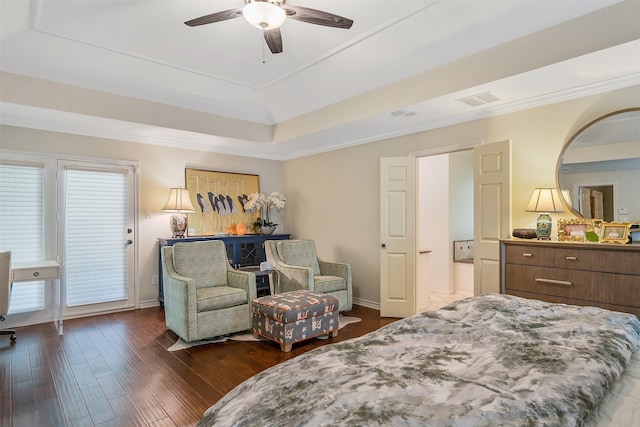 bedroom featuring crown molding, ceiling fan, a tray ceiling, and dark hardwood / wood-style flooring