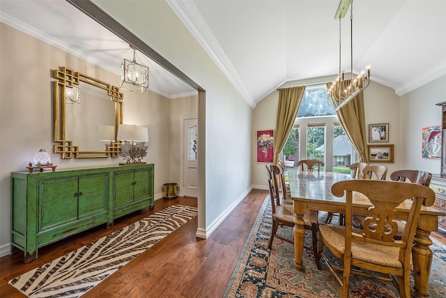 dining space featuring crown molding, dark hardwood / wood-style floors, a chandelier, and vaulted ceiling