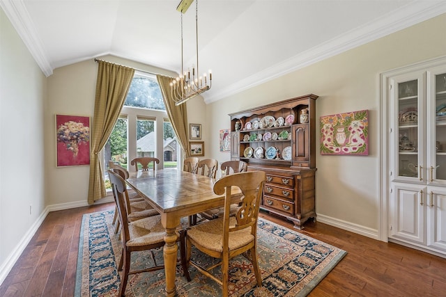 dining area with ornamental molding, lofted ceiling, dark wood-type flooring, and a chandelier