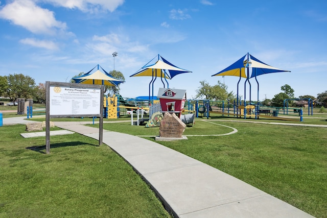 view of playground with a yard