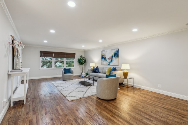 living room featuring ornamental molding and hardwood / wood-style floors