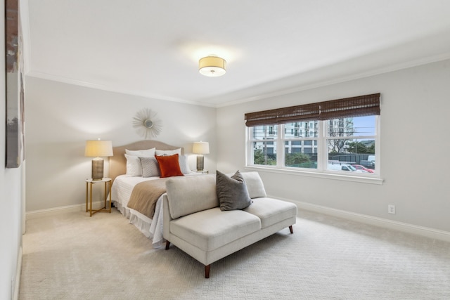 bedroom with crown molding and light carpet