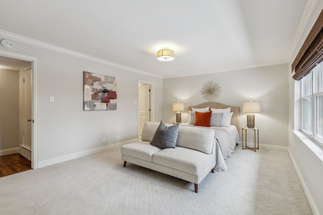 bedroom featuring crown molding and light colored carpet