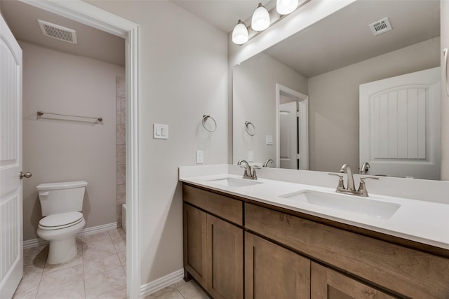 full bathroom featuring tile patterned floors, bathing tub / shower combination, vanity, and toilet