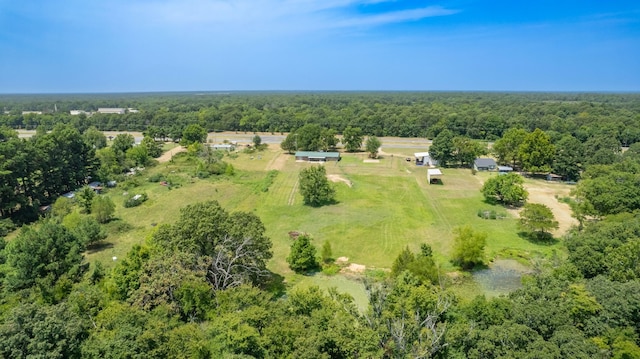 birds eye view of property with a rural view