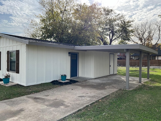 232 Alto Dr, Garland, TX 75040 - exterior space featuring a lawn, fence, and a carport