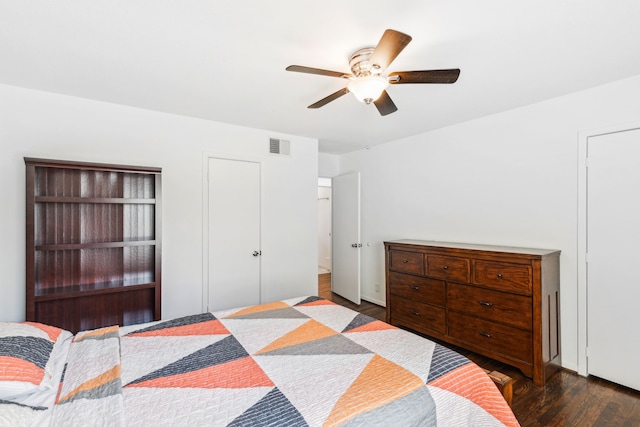 bedroom featuring ceiling fan and dark hardwood / wood-style flooring