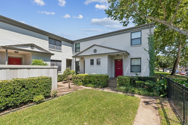 view of front of home with a front yard