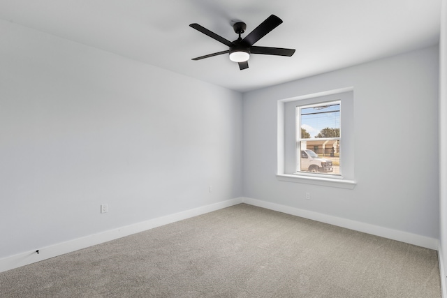 unfurnished room featuring carpet flooring and ceiling fan