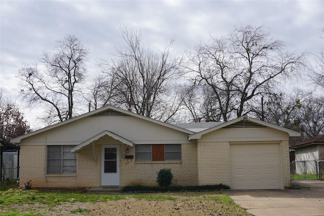 single story home with a garage