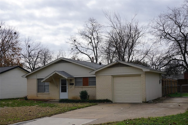 single story home featuring a garage