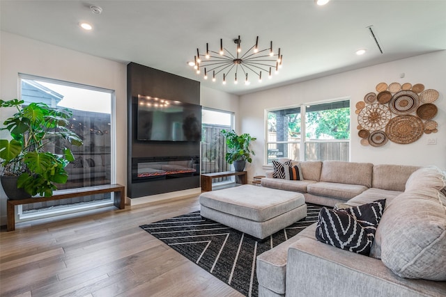 living room with light hardwood / wood-style flooring