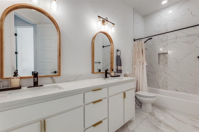 full bathroom featuring vanity, toilet, and shower / tub combo with curtain