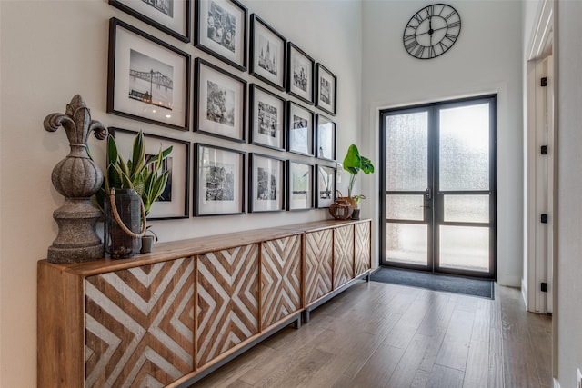 interior space featuring wood-type flooring and french doors