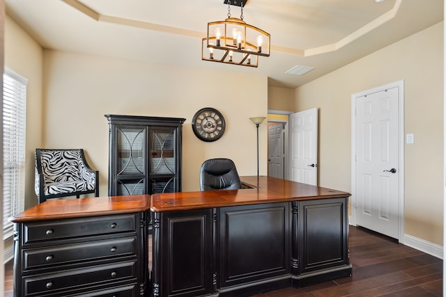 office area featuring a notable chandelier and dark hardwood / wood-style flooring