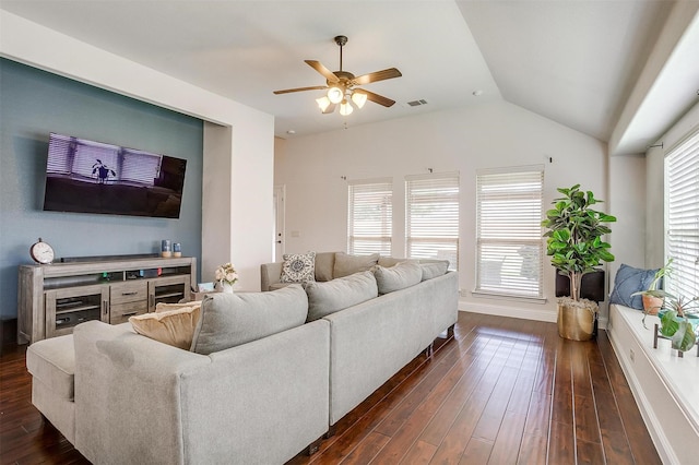 living room featuring ceiling fan, lofted ceiling, and dark wood-type flooring