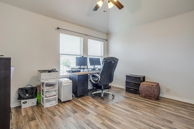 office area with ceiling fan, hardwood / wood-style floors, and lofted ceiling