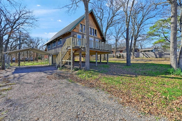 view of front of house with a wooden deck