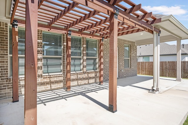 view of patio featuring a pergola