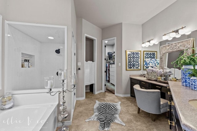 bathroom featuring plus walk in shower and vanity