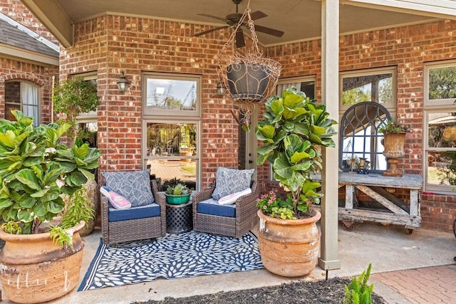 view of patio / terrace featuring ceiling fan