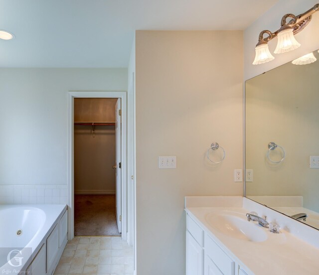 bathroom featuring a tub and vanity