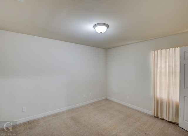 view of carpeted spare room