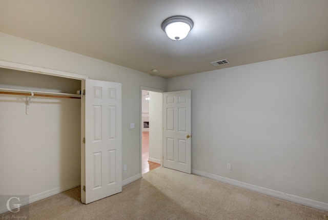 unfurnished bedroom featuring a closet