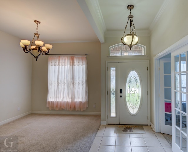 entryway featuring crown molding, light colored carpet, and a chandelier