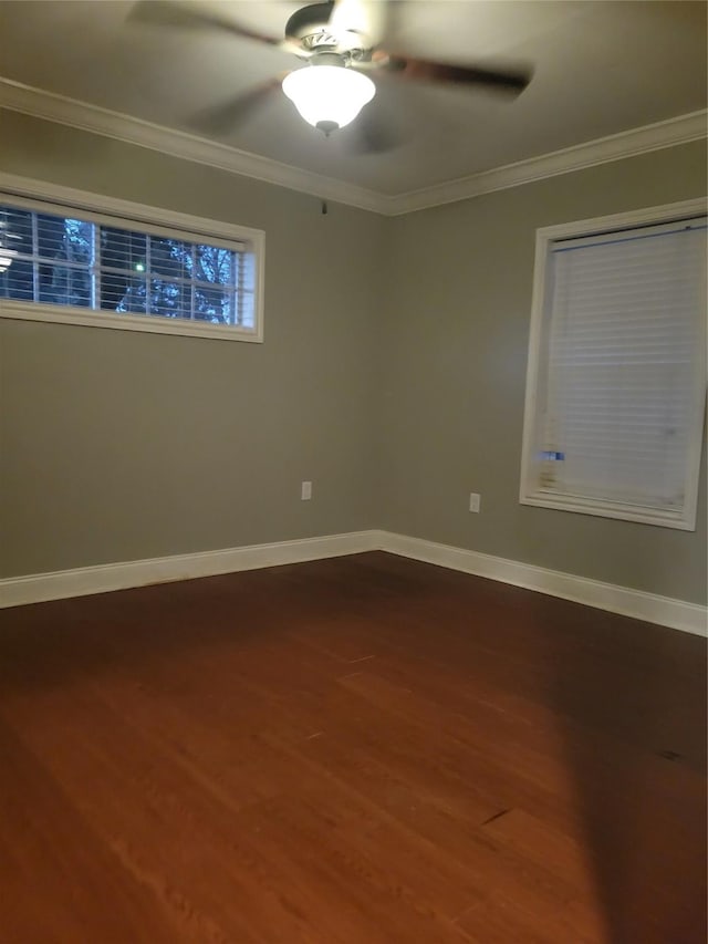 empty room with hardwood / wood-style flooring, ceiling fan, and ornamental molding