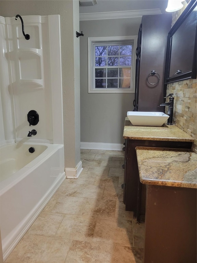 bathroom with shower / tub combination, vanity, tasteful backsplash, and ornamental molding