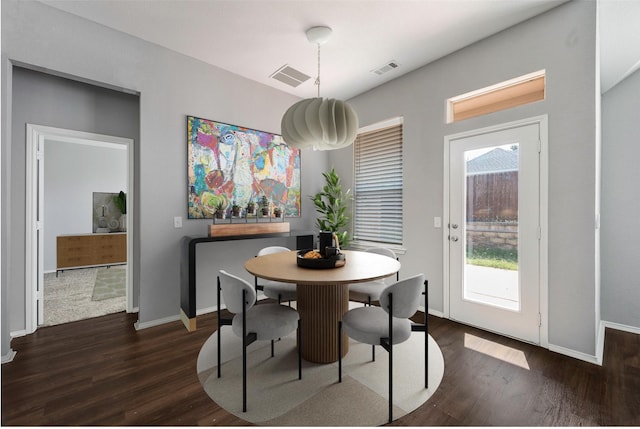 dining room featuring dark hardwood / wood-style floors