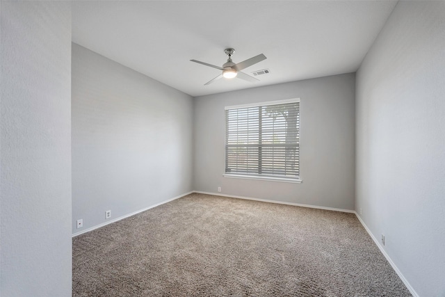 carpeted empty room with ceiling fan