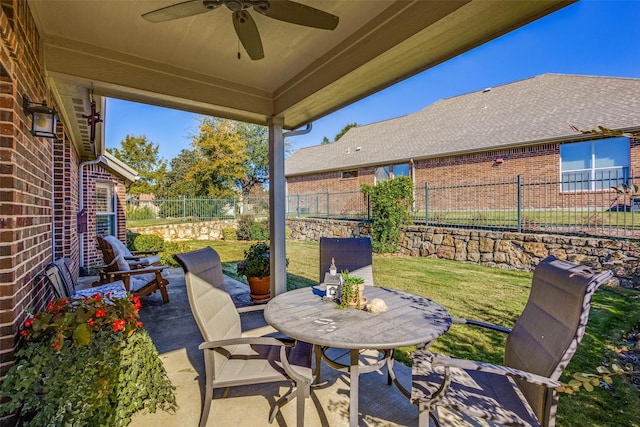 view of patio featuring ceiling fan