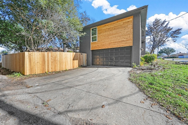 view of home's exterior featuring a garage