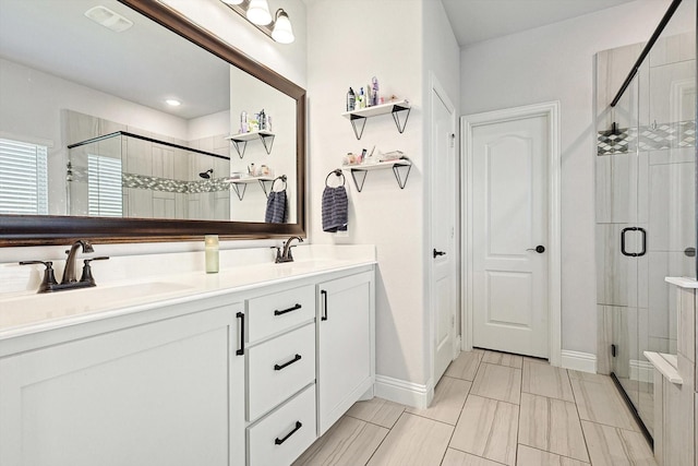 bathroom featuring vanity and walk in shower