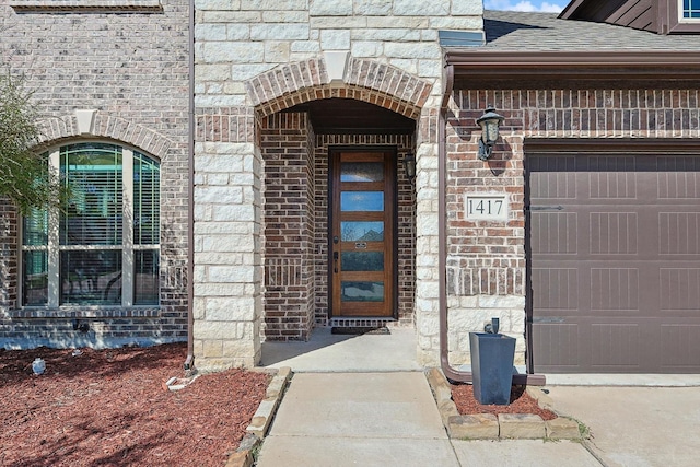 entrance to property featuring a garage