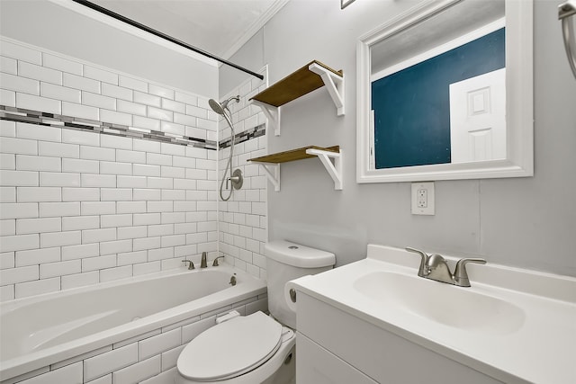 full bathroom featuring vanity, toilet, crown molding, and tiled shower / bath combo