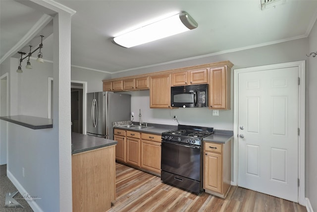 kitchen with black appliances, sink, light wood-type flooring, and crown molding