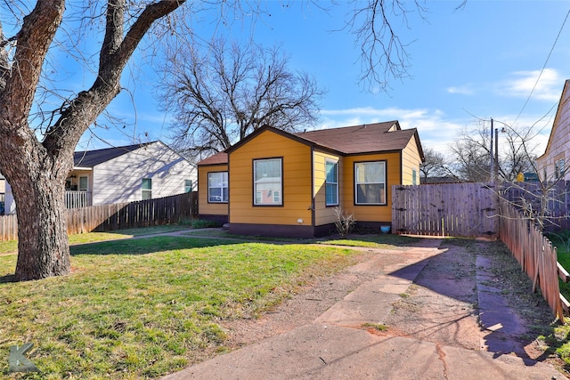 view of front of home with a front yard