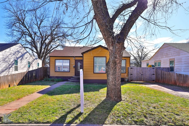 view of front of home with a front yard