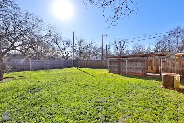 view of yard with central AC