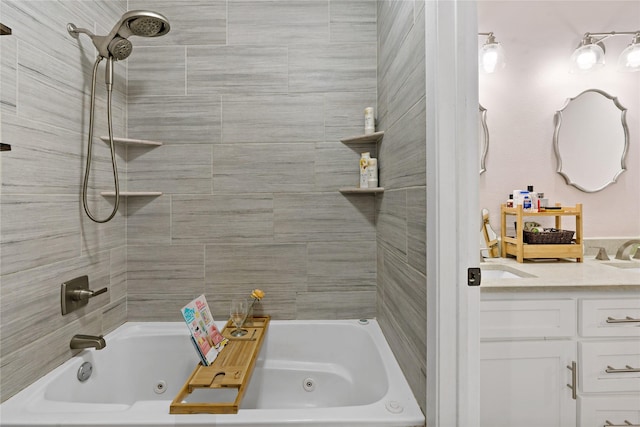 bathroom with vanity and tiled shower / bath